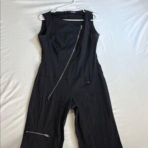 Stradivarius Black Jumpsuit with Zipper Detail
35” inseam
17” PTP
18”hips
